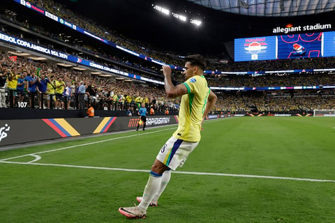 Lucas Paqueta celebrates after scoring Brazil's fourth goal